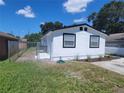 Newly renovated home with a fresh coat of paint and landscaping at 3611 3Rd S Ave, St Petersburg, FL 33711