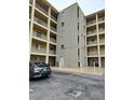 Condo building showcasing the parking area at 3756 Lake Bayshore # 509, Bradenton, FL 34205