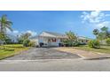 Single-story home exterior with carport and landscaping at 4424 Mount Vernon Dr, Bradenton, FL 34210