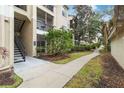 Condo building exterior showing stairs and walkway at 5180 Northridge Rd # 211, Sarasota, FL 34238