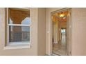 Condo entryway with a door that opens to a view of the interior at 5531 Cannes Cir # 802, Sarasota, FL 34231