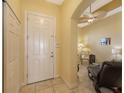 Condo entryway with a view of the interior living area at 5531 Cannes Cir # 802, Sarasota, FL 34231