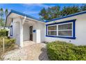 Front entrance with walkway, mailbox, and landscaping at 5823 26Th W St, Bradenton, FL 34207