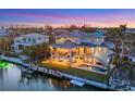 Luxury waterfront home with private dock and pool at 608 Bayview Dr, Longboat Key, FL 34228