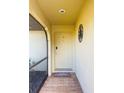 Exterior entryway with tiled flooring and screened-in porch at 1170 Richter St, Port Charlotte, FL 33952