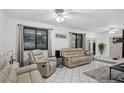 Spacious living room featuring comfortable seating and large windows at 1170 Richter St, Port Charlotte, FL 33952