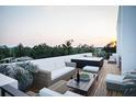 Relaxing rooftop terrace with hot tub and city views at 162 Audubon Pl, Sarasota, FL 34237