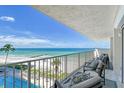 Spacious balcony overlooking the beach and ocean at 2301 Gulf Of Mexico Dr # 52N, Longboat Key, FL 34228