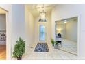 Bright and spacious entryway with tile flooring at 232 Venice Palms Blvd, Venice, FL 34292