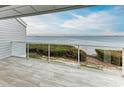 Deck with water views and glass railings at 25 Tidy Island Blvd # 25, Bradenton, FL 34210