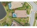 Top-down view of house with private pool and spa at 7204 Annanhill Ln, Lakewood Ranch, FL 34202