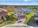 Two-story house with a lake view in a new neighborhood at 8208 Carrhill Pl, Parrish, FL 34219