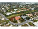 An aerial view showcasing a home's location within a residential community at 1212 Windward Dr, Osprey, FL 34229