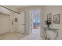 Elegant entryway with elevator access and view into living area at 1233 N Gulfstream Ave # 502, Sarasota, FL 34236