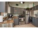 Updated kitchen featuring stainless steel appliances and granite countertops at 2206 25Th W Ave, Bradenton, FL 34205