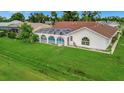 House with pool and large backyard seen from above at 26071 Paysandu Dr, Punta Gorda, FL 33983