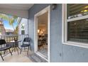 Private patio with seating and view of greenery at 3815 59Th W Ave # 3815, Bradenton, FL 34210