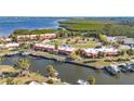 Aerial view of property featuring docks and serene water views at 4009 Catalina Dr # 178, Bradenton, FL 34210