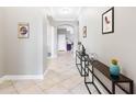 Bright and airy hallway with tile flooring at 4653 Royal Dornoch Cir, Bradenton, FL 34211