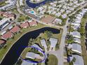 Aerial view of canal-front home with community amenities at 4714 Potomac Cir, Bradenton, FL 34210