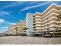 Condo building with parking and ocean view at 5780 Midnight Pass Rd # 609, Sarasota, FL 34242