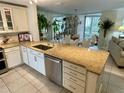 Updated kitchen featuring granite island and stainless steel appliances at 6101 34Th W St # 28B, Bradenton, FL 34210