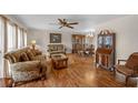 Spacious living room featuring hardwood floors and ample natural light at 7510 16Th Nw Ave, Bradenton, FL 34209