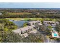 Aerial view of condo community near golf course and lake at 8901 Veranda Way # 116, Sarasota, FL 34238