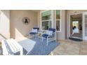 Condo screened porch with patio furniture at 8901 Veranda Way # 116, Sarasota, FL 34238