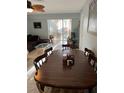 Dining room with a large wooden table and chairs at 6304 Pointe West Blvd # A203, Bradenton, FL 34209