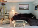 Living Room with L-shaped sofa and coffee table at 6304 Pointe West Blvd # A203, Bradenton, FL 34209