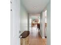 Inviting entryway with view into the living and dining areas at 404 Cerromar N Cir # 108, Venice, FL 34293