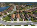 Aerial view of a residential neighborhood showing a single-Gathering home at 491 Casalino Dr, Nokomis, FL 34275