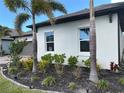 Well maintained lawn with healthy shrubs and mulch beds at 12571 Night View Dr, Sarasota, FL 34238