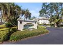 Mirabella Condominiums entrance sign and building view at 200 Mirabella Cir # 201, Venice, FL 34292