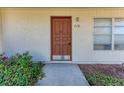 Front door entrance with walkway and landscaping at 318 Barlow Ave # 71, Sarasota, FL 34232