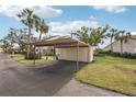 Covered carport parking space for a condo unit at 712 Bird Bay Dr # 146, Venice, FL 34285