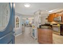 Bright and spacious entryway with view into the living area and kitchen at 1243 Siesta Bayside Dr # D, Sarasota, FL 34242