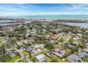 Aerial view of a residential neighborhood near the water at 305 Pameto Rd, Nokomis, FL 34275