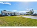 Aerial view of a row of houses with green lawns at 3701 39Th W St, Bradenton, FL 34205