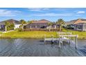 Private dock and backyard access to the peaceful canal at 5607 Tidewater Preserve Blvd, Bradenton, FL 34208