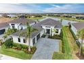 Luxury home with lake view in an upscale community at 9048 Bernini Pl, Sarasota, FL 34240