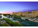 Luxury waterfront community with boats and beautiful sunset at 14041 Bellagio Way # 315, Osprey, FL 34229