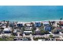Aerial view of beachfront property with ocean views at 6501 Gulf Of Mexico Dr, Longboat Key, FL 34228