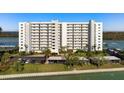 Condo building with waterfront and parking at 9397 Midnight Pass Rd # 404, Sarasota, FL 34242