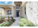 Welcoming front entry with walkway and landscaping at 11124 Sanctuary Dr, Bradenton, FL 34209