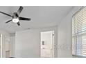 Bright bedroom with ceiling fan and access to bathroom at 2807 W 52Nd Ter, Bradenton, FL 34207