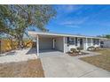 Updated home with carport and front yard landscaping at 2807 W 52Nd Ter, Bradenton, FL 34207