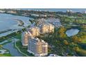 Aerial view of waterfront community with marina at 3010 Grand Bay Blvd # 493, Longboat Key, FL 34228