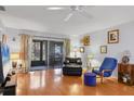 Spacious living area featuring hardwood floors and seating at 3336 Tallywood Ct # 7084, Sarasota, FL 34237